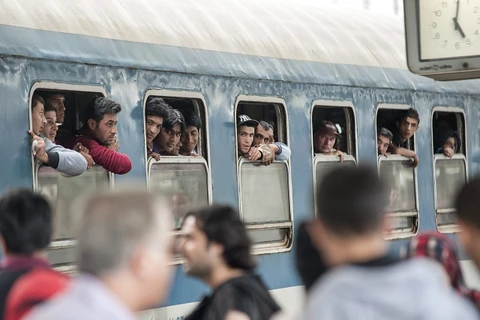 Một đoàn tàu chở người tị nạn Syria ở châu Âu. (Nguồn: CTK)