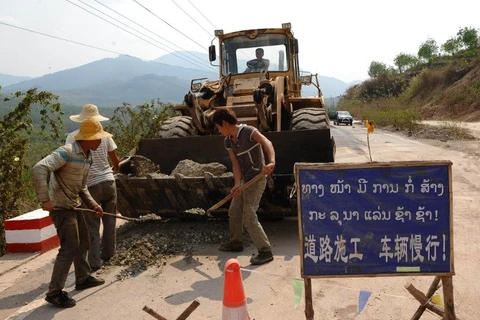 Công nhân Trung Quốc làm việc ở Lào. (Nguồn: AFP)