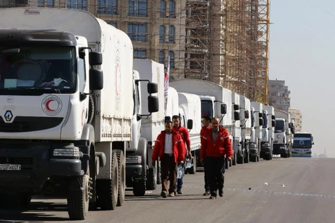 Đoàn xe chở hàng cứ trợ nhân đạo ở Damascus, ngày 17/2. (Nguồn: AFP)