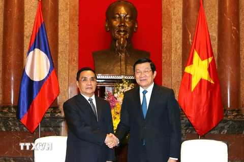 Chủ tịch nước Trương Tấn Sang tiếp Thủ tướng Lào Thongsing Thammavong. (Ảnh: Nguyễn Khang/TTXVN)