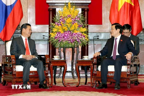 Chủ tịch nước Trương Tấn Sang tiếp Phó Thủ tướng Lào Somsavat Lengsavad sang thăm và làm việc tại Việt Nam. (Ảnh: Nguyễn Khang/TTXVN)