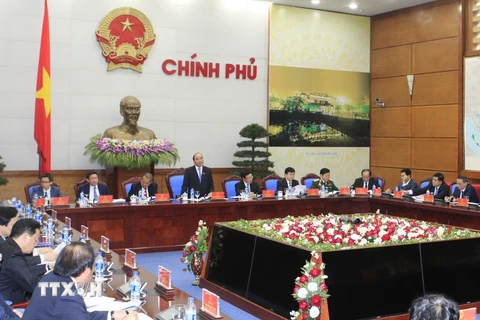 Thủ tướng Nguyễn Xuân Phúc chủ trì phiên họp các thành viên Chính phủ mới được phê chuẩn tại kỳ họp lần thứ 11, Quốc hội khóa XIII. (Ảnh: Thống Nhất/TTXVN)