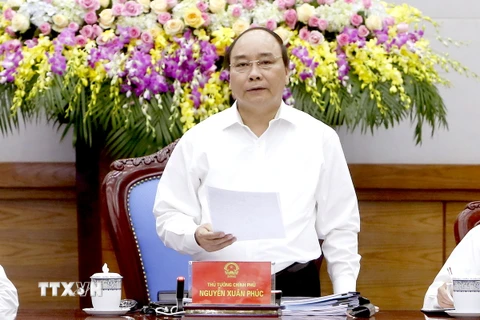 Thủ tướng Nguyễn Xuân Phúc chủ trì phiên họp Chính phủ thường kỳ tháng Tư. (Ảnh: Thống Nhất/TTXVN)