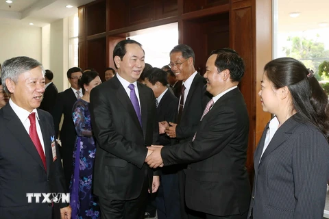 Chủ tịch nước Trần Đại Quang đến thăm, nói chuyện với cán bộ, nhân viên Đại sứ quán Việt Nam và đại diện cộng đồng Việt kiều. (Ảnh: Nhan Sáng/TTXVN)
