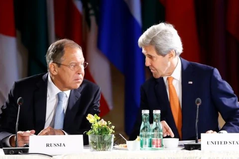 Ngoại trưởng Nga Sergei Lavrov và người đồng cấp Mỹ John Kerry. (Nguồn: Reuters)