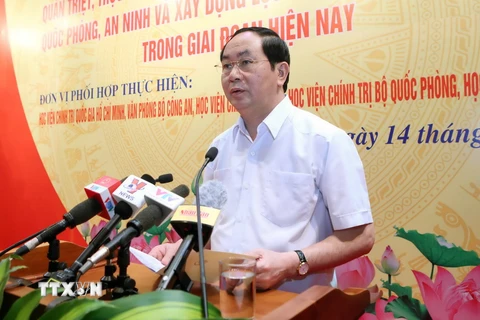 Chủ tịch nước Trần Đại Quang dự và phát biểu tại Hội thảo. (Ảnh: Nhan Sáng/TTXVN)