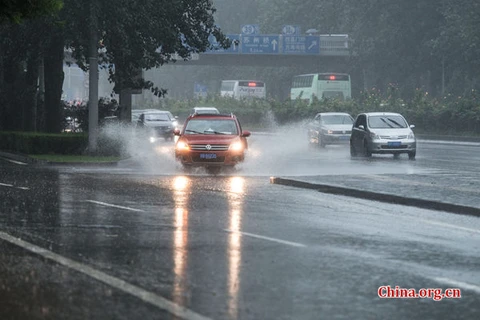 Mưa lớn trong sáng 20/7 ở Bắc Kinh. (Nguồn: THX)