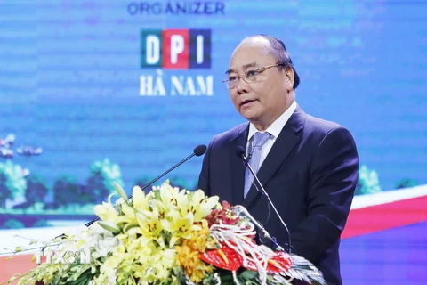 Thủ tướng Nguyễn Xuân Phúc phát biểu tại hội nghị. (Ảnh: An Đăng/TTXVN)