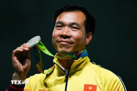 Xạ thủ Hoàng Xuân Vinh mang về tấm Huy chương thứ hai cho thể thao Việt Nam tại Olympic Rio ngày 10/8. (Nguồn: AFP/ TTXVN)