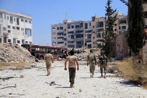 Quân Chính phủ Syria ở ngoại ô Aleppo. (Nguồn: AFP)