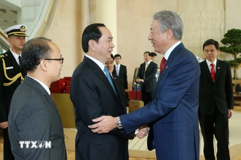 Chủ tịch nước Trần Đại Quang tiếp Phó Thủ tướng Singapore Tiêu Chí Hiền. (Ảnh: Nhan Sáng/TTXVN)