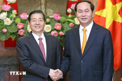 Chủ tịch nước Trần Đại Quang tiếp ông Quách Thanh Côn, Ủy viên Quốc vụ, Bộ trưởng Bộ Công an Trung Quốc đang thăm và làm việc tại Việt Nam. (Ảnh: Nhan Sáng/TTXVN)