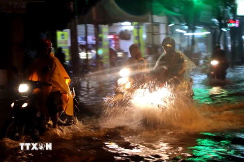 Ngập úng ở đường Vườn Lan, quận Tân Bình, Thành phố Hồ Chí Minh, ngày 26/9. (Ảnh: Hoàng Hải/TTXVN)