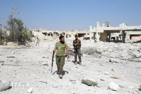 Cảnh tàn phá sau các cuộc giao tranh tại Aleppo. (Nguồn: AFP/TTXVN)