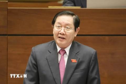 Bộ trưởng Bộ Nội vụ Lê Vĩnh Tân trả lời chất vấn. (Ảnh: Phương Hoa/TTXVN)