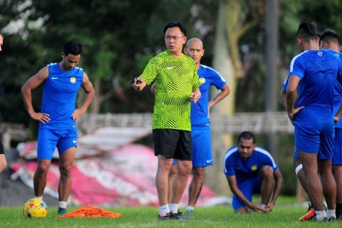 Huấn luyện viên trưởng đội tuyển Malaysia Ong Kim Swee và các học trò. (Nguồn: espnfc.com)
