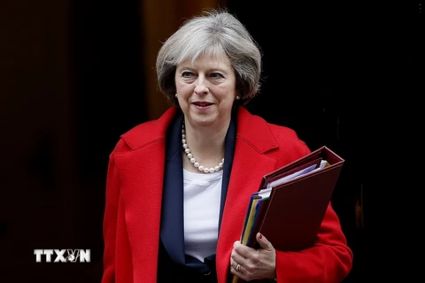 Thủ tướng Anh Theresa May tới dự phiên họp chất vấn tại Nghị viện ở London ngày 23/11. (Nguồn: AP/TTXVN)