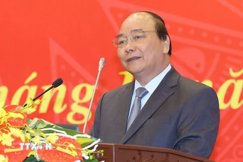 Thủ tướng Nguyễn Xuân Phúc phát biểu tại hội nghị. (Ảnh: Doãn Tấn/TTXVN)