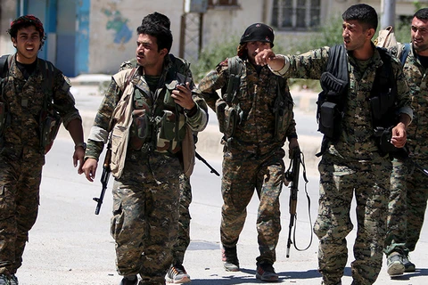 Các binh sỹ của Các Đơn vị Bảo vệ Nhân dân Người Kurd (YPG) ở Syria. (Nguồn: Reuters)