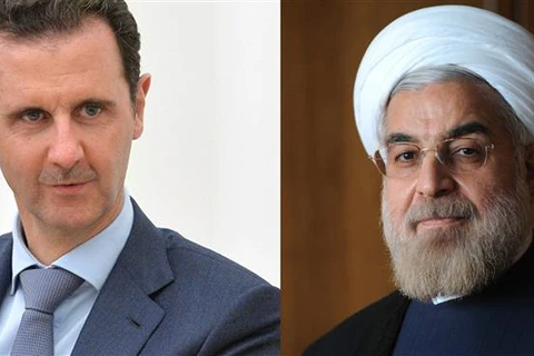Tổng thống Syria Bashar Al-Assad và người đồng cấp Iran Hassan Rouhani. (Nguồn: presstv)
