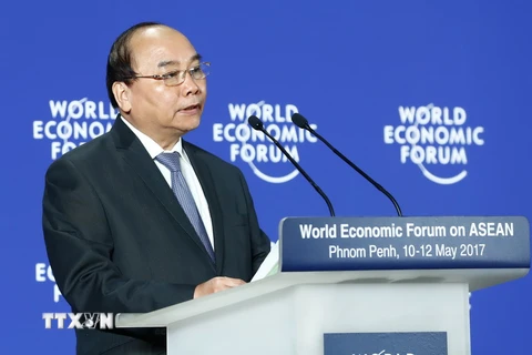 Thủ tướng Nguyễn Xuân Phúc phát biểu tại diễn đàn. (Ảnh: Thống Nhất/TTXVN)