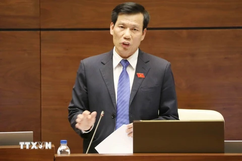 Bộ trưởng Bộ Văn hóa, Thể thao và Du lịch Nguyễn Ngọc Thiện trả lời chất vấn của Đại biểu Quốc hội. (Ảnh: Phương Hoa/TTXVN)