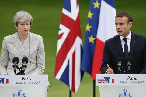 Tổng thống Pháp Emmanuel Macron và Thủ tướng Anh Theresa May họp báo sau hội đàm. (Nguồn: PA)