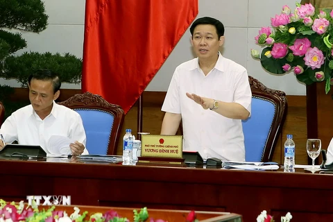 Phó Thủ tướng Chính phủ Vương Đình Huệ chủ trì hội thảo. (Ảnh: Nguyễn Dân/TTXVN)