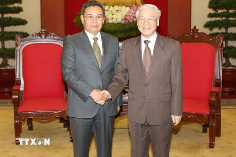 Tổng Bí thư Nguyễn Phú Trọng tiếp Chủ tịch Ủy ban Trung ương Mặt trận Lào xây dựng đất nước Saysomphone Phomvihane. (Ảnh: Trí Dũng/TTXVN)