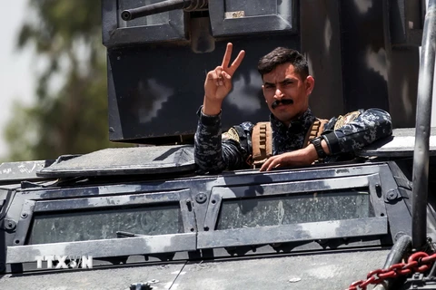 Binh sĩ Iraq trong cuộc chiến chống IS tại thành cổ Mosul ngày 26/6. (Nguồn: AFP/TTXVN)