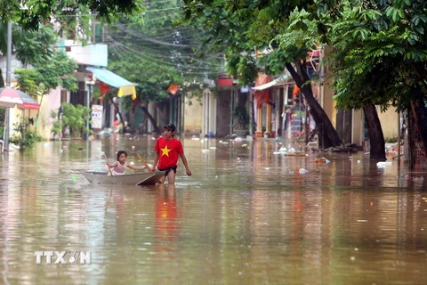 Nước sông Thao dâng cao gây ngập lụt nhiều khu vực tại thành phố Yên Bái. (Ảnh; Thế Duyệt/TTXVN)