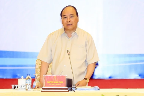 Thủ tướng Nguyễn Xuân Phúc phát biểu tại buổi đối thoại. (Ảnh: Thống Nhất/TTXVN)