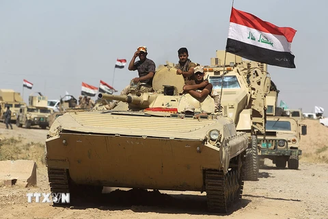 Các lực lượng Iraq tiến vào Hawija trong chiến dịch giải phóng thị trấn này từ IS ngày 2/10. (Nguồn: AFP/TTXVN)