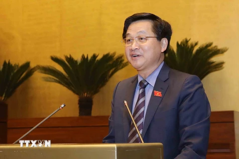 Tổng Thanh tra Chính phủ Lê Minh Khái trình bày Tờ trình về dự án Luật Phòng, chống tham nhũng (sửa đổi). (Ảnh: Phương Hoa/TTXVN)