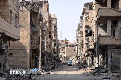 Cảnh đổ nát do xung đột ở thành phố miền đông Deir Ezzor ngày 4/11. (Nguồn: AFP/ TTXVN)