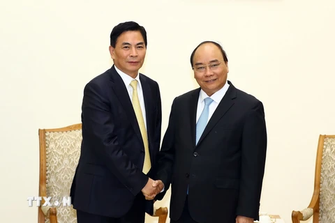 Thủ tướng Nguyễn Xuân Phúc tiếp ông Thẩm Thiên Tinh, Chủ tịch Tập đoàn Giai Nguyên (Hong Kong, Trung Quốc). (Ảnh: Thống Nhất/TTXVN)