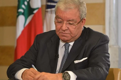 Bộ trưởng Nội vụ Liban Nohad Mashnouk ký sắc lệnh tổ chức bầu cử quốc hội. (Nguồn: NNA)