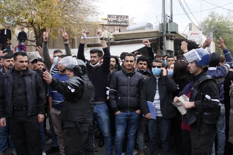 Người Kurd biểu tình ở thành phố Sulaimaniyah, ngày 19/12. (Nguồn: AFP)