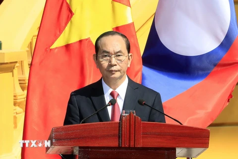 Chủ tịch nước Trần Đại Quang phát biểu tại buổi họp báo. (Ảnh: Nhan Sáng/TTXVN)