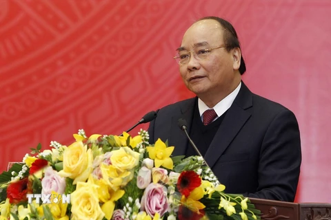 Thủ tướng Nguyễn Xuân Phúc phát biểu tại hội nghị. (Ảnh: Văn Điệp/TTXVN)