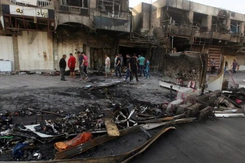 Hiện trường một vụ đánh bom ở Baghdad. (Nguồn: iraqinews.com)