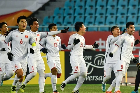 Các cầu thủ U23 Việt Nam ăn mừng sau chiến thắng lịch sử trưởng U23 Qatar. (Nguồn: The AFC.com)