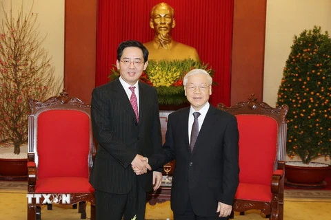Tổng Bí thư Nguyễn Phú Trọng tiếp Đại sứ Trung Quốc Hồng Tiểu Dũng đến chào từ biệt. (Ảnh: Trí Dũng/TTXVN)