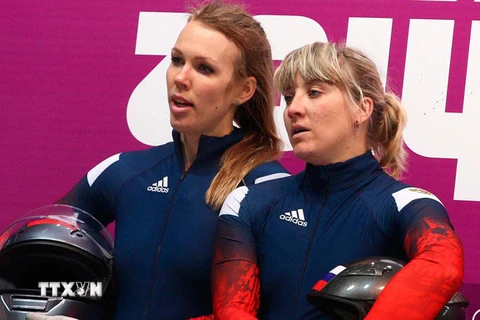 Vận động viên xe trượt tuyết Nadezhda Sergeyeva (ảnh, trái). (Nguồn: TASS/TTXVN)