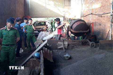 Chế biến càphê bẩn tại cơ sở của bà Nguyễn Thị Thanh Loan (huyện Đắk Lấp) bị cơ quan chức năng tỉnh Đắk Nông phát hiện. (Nguồn: TTXVN phát) 
