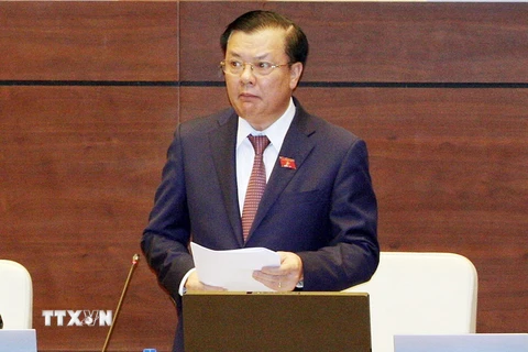 Bộ trưởng Bộ Tài chính Đinh Tiến Dũng phát biểu. (Ảnh: Nguyễn Dân/TTXVN)