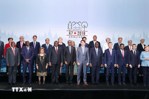 Thủ tướng Nguyễn Xuân Phúc và các trưởng đoàn G7 và G7 mở rộng. (Ảnh: Thống Nhất/TTXVN)