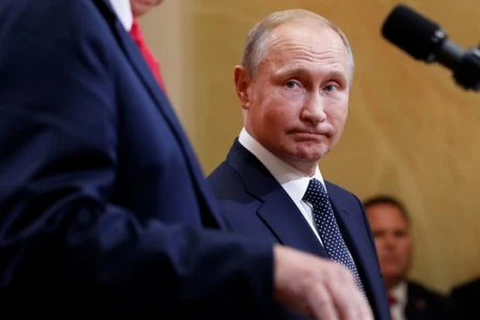 Tổng thống Nga Vladimir Putin tại cuộc họp báo chung sau cuộc gặp thượng đỉnh Mỹ-Nga ở Helsinki, Phần Lan ngày 16/7. (Nguồn: Reuters)