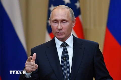 Tổng thống Nga Vladimir Putin trong cuộc họp báo chung sau hội nghị thượng đỉnh với Tổng thống Mỹ Donald Trump ở Helsinki, Phần Lan ngày 16/7. (Nguồn: AFP/ TTXVN)