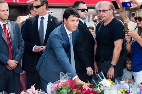 Thủ tướng Canada Justin Trudeau tham dự lễ tưởng niệm các nạn nhân trong vụ xả súng ở Toronto. (Nguồn: THE CANADIAN PRESS)